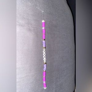 Homemade explicit bracelet with clay beads